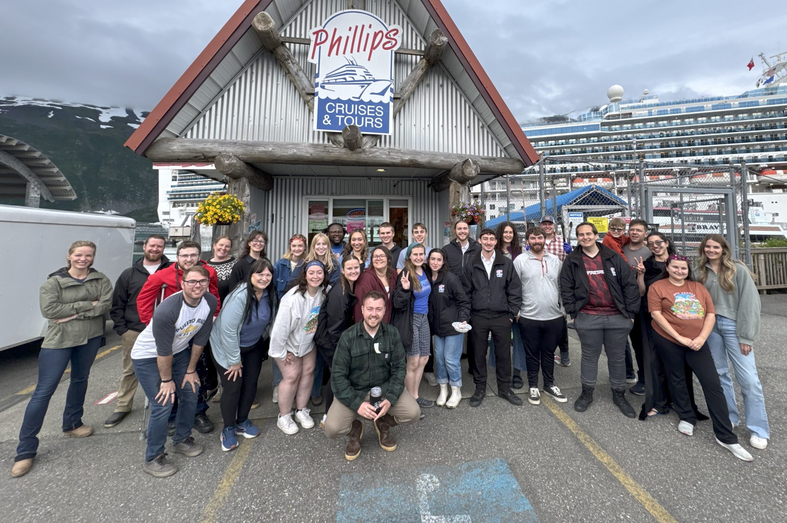 Crew Photo in front of Kiosk